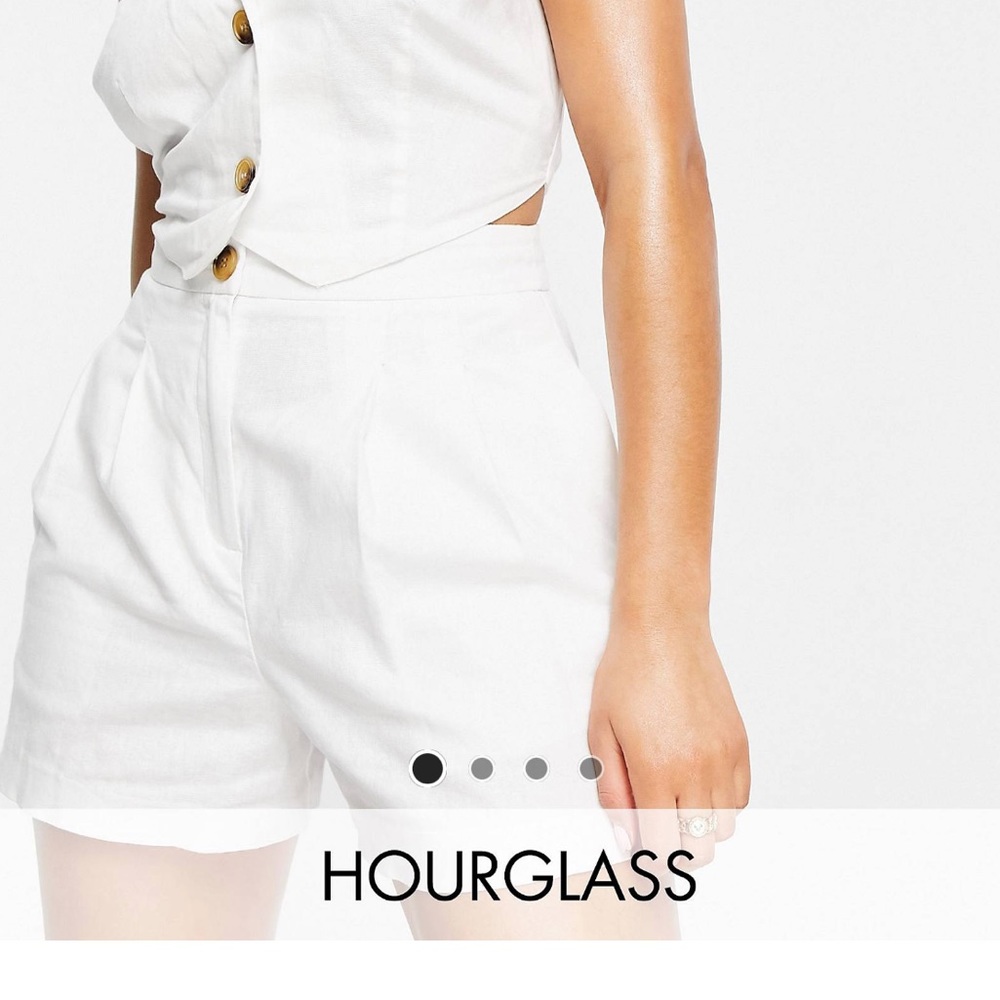 White linen high waisted pleated shorts